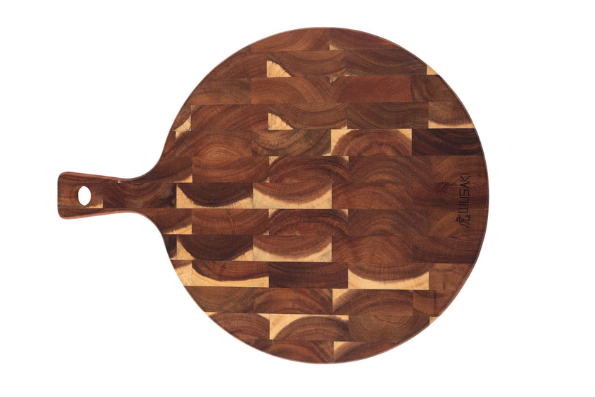 Planche à découper Wusaki ronde en acacia 42,5 x 32cm