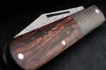 Couteau pliant Böker Barlow Integral Leopard 100501DAM manche en micarta noir et bois de fer 8,5cm + étui en feutre