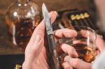 Couteau pliant Böker Barlow Integral Leopard 100501DAM manche en micarta noir et bois de fer 8,5cm + étui en feutre
