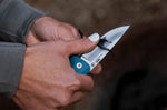 Couteau pliant SOG Adventurer LB Nordic SGADVBL manche nylon et fibres de verre bleu 10cm