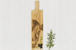 Planche apéritif en chêne Selbrae House 65x15x2cm avec poignée - Motif vache