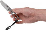 Couteau Esee Imlay ESEE-IMLAY-OR lame semi-dentée 6,2cm manche ajouré inox + étui orange