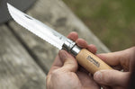 Couteau pliant Opinel n°12 lame crantée 12cm manche hêtre