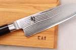 Coffret 1 couteau santoku Kai Shun Classic 18cm + 1 planche en bois KAI offerte