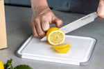 Planche à découper anti-glisse Kitchen Aid réversible en PP blanc - 25 x 20 cm