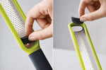 Mini râpe zesteur Joseph Joseph Handi-Zest avec système de nettoyage vert