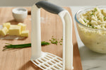 Presse-purée ergonomique Joseph Joseph Easy-Mash en polymère blanc