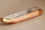 Couteau pliant Forge de Laguiole manche en bois de genévrier 11cm mitres en laiton