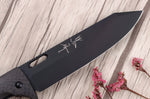 Couteau pliant japonais Yu Kurosaki Kurohyo SG2 manche en fibre de carbone 13,2cm