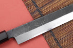 Couteau sakimaru 27cm japonais artisanal Hatsukokoro Shirasagi manche en ébène