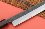 Couteau yanagiba 24cm japonais artisanal Hatsukokoro Shirasagi manche en ébène