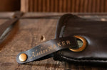 Manique Alaskan Maker Defender noir et orange en cuir