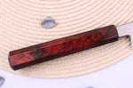 Couteau yanagiba japonais 27cm Sakai Takayuki Nanairo manche en résine laqué rouge
