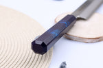 Couteau yanagiba japonais 27cm Sakai Takayuki Nanairo manche en résine laqué bleu