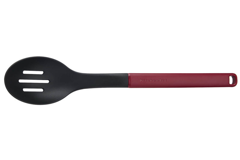 Cuillère ajourée Kitchen Aid en nylon 34cm - Rouge