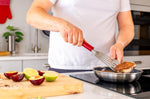 Spatule de cuisine ajourée Kitchen Aid en acier inoxydable 31,5cm - Rouge