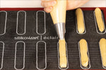 Tapis de cuisson Silikomart éclair et choux en silicone professionnel et fibres de verre micro-perforées 30x40cm