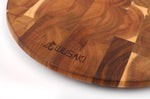 Planche à découper Wusaki ronde en acacia 42,5 x 32 x 1,8cm