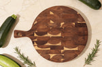 Planche à découper Wusaki ronde en acacia 42,5 x 32 x 1,8cm