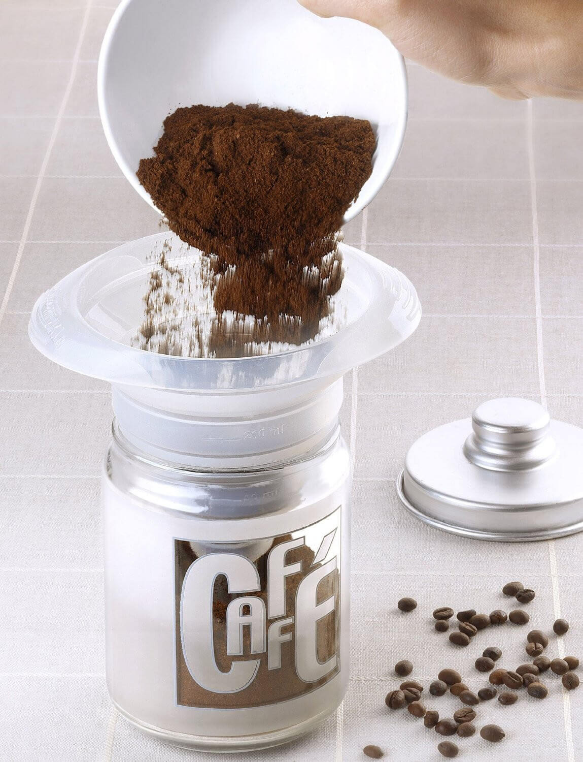 Entonnoir pliable transparent SILIKOMART + bouchon
