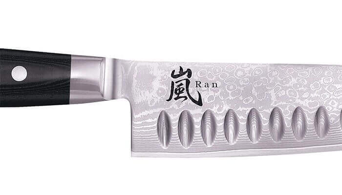 Couteau de chef japonais Yaxell RAN lame 20cm alvéolé damas 69 couches
