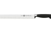 Couteau à trancher Zwilling Four Star lame forgée alvéolée 26cm