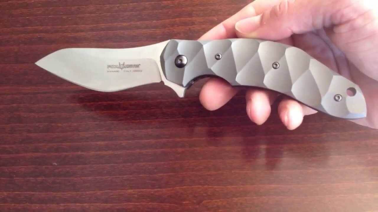 Couteau pliant Ansø FOX FX-302 manche 12cm titanium ondulé + étui
