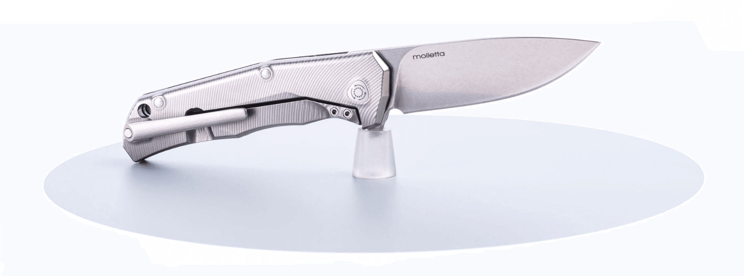 Couteau pliant LionSteel Tre manche G10 / titanium 10cm - Noir
