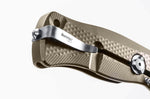 Couteau pliant LionSteel SR11 manche titanium 12cm pic brise-vitre + étui cuir - Bronze
