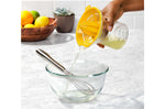Presse agrumes OXO citron et orange avec récipient doseur
