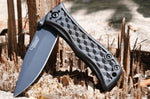 Couteau pliant Camillus Erupt manche en nylon noir et fibres de verre à motif cubique 7,8cm