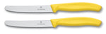 2 couteaux de table Victorinox jaunes lames crantées 11cm bout rond