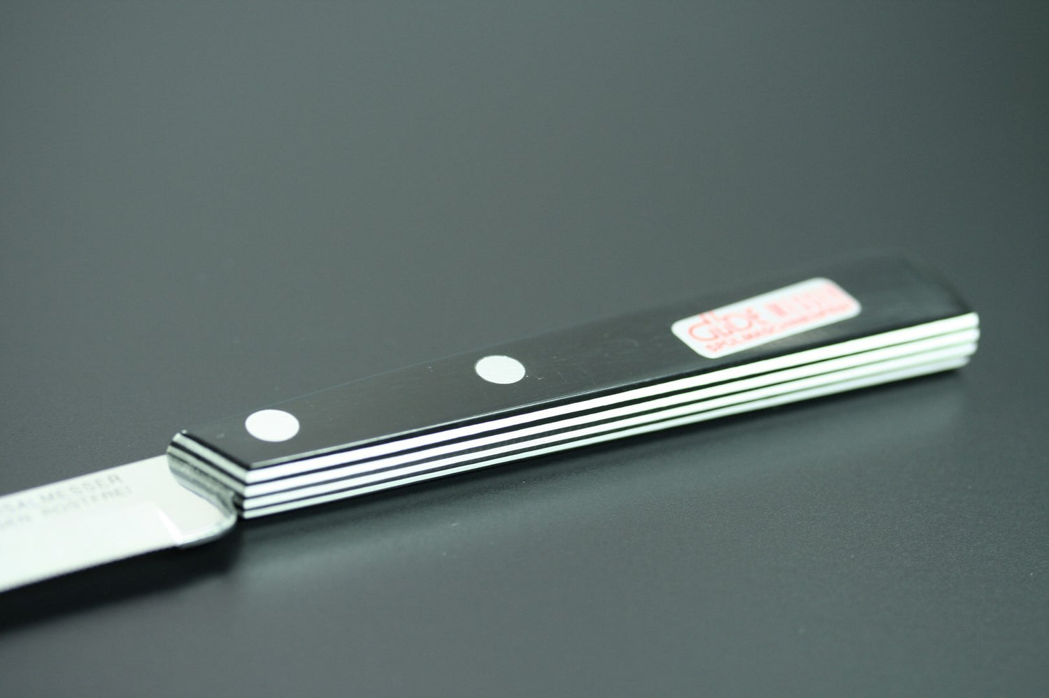 Couteau de table GÜDE Universel 10cm micro-denté manche noir/blanc