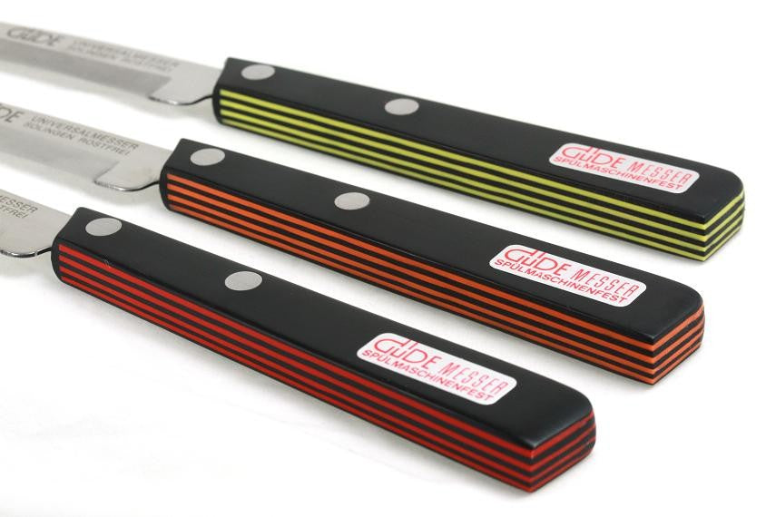 Couteau de table GÜDE Universel 10cm micro-denté manche noir/rouge