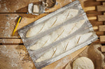 Plaque de cuisson De Buyer perforée en inox pour 3 baguettes