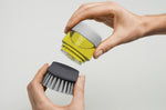 Brosse à vaisselle Joseph Joseph Palm Scrub avec réservoir - Gris
