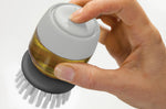 Brosse à vaisselle Joseph Joseph Palm Scrub avec réservoir - Gris