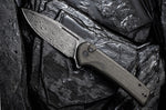 Couteau pliant CIVIVI Conspirator C21006DS1 lame Damas manche Micarta noir et vert 11,7cm