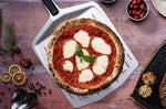 Pelle à pizza perforée Ooni 30cm en aluminium anodisé