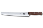Couteau Pâtissier / Traiteur Victorinox - lame dentée 26 cm - manche érable