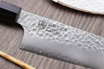 Couteau santoku japonais Kanetsugu Heptagon Uto martelé 17cm