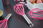 Fouet de cuisine Rösle Pink Charity en silicone rose 27cm