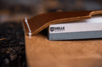Pierre à aiguiser Helle H300301 double face grains 320/500 taille S avec étui en cuir
