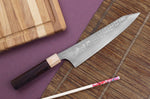 Couteau de chef japonais artisanal martelé Yu Kurosaki senko 21cm acier SG2