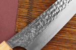 Couteau de chef japonais artisanal martelé Yu Kurosaki senko 21cm acier SG2