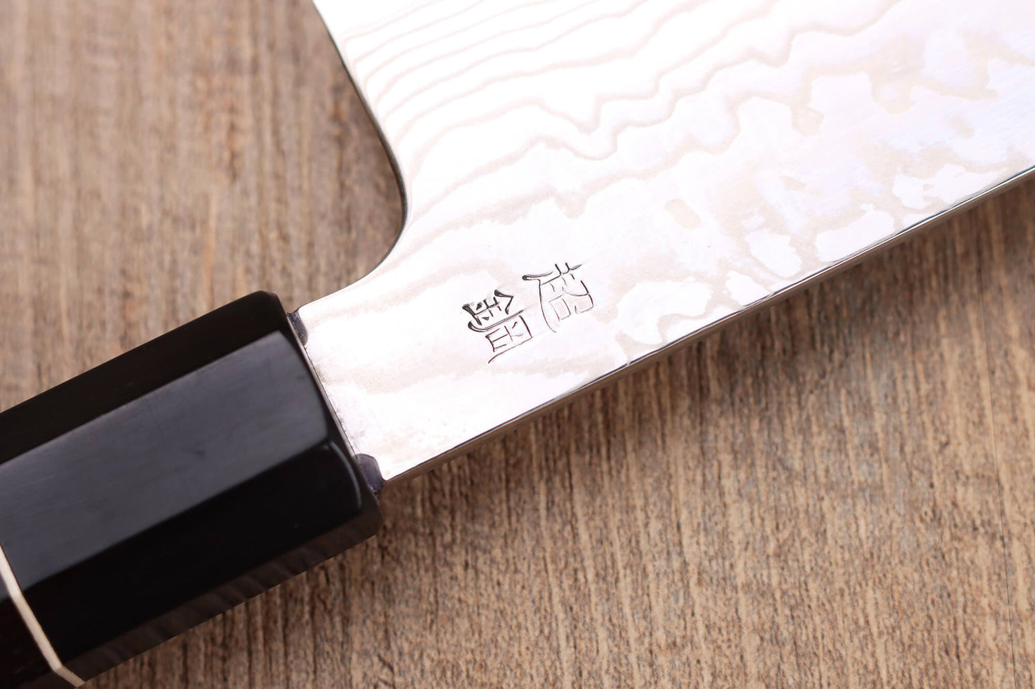 Couteau santoku 19,5cm japonais artisanal Sukenari ZDP-189 damas manche en ébène